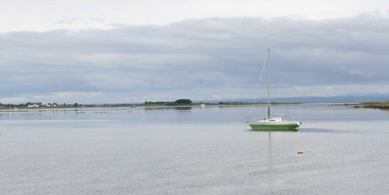 Boat-on-Tarrea-bay-calm-July-2017